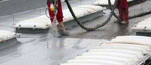 Applicazione poliurea a spruzzo su tetto capannone